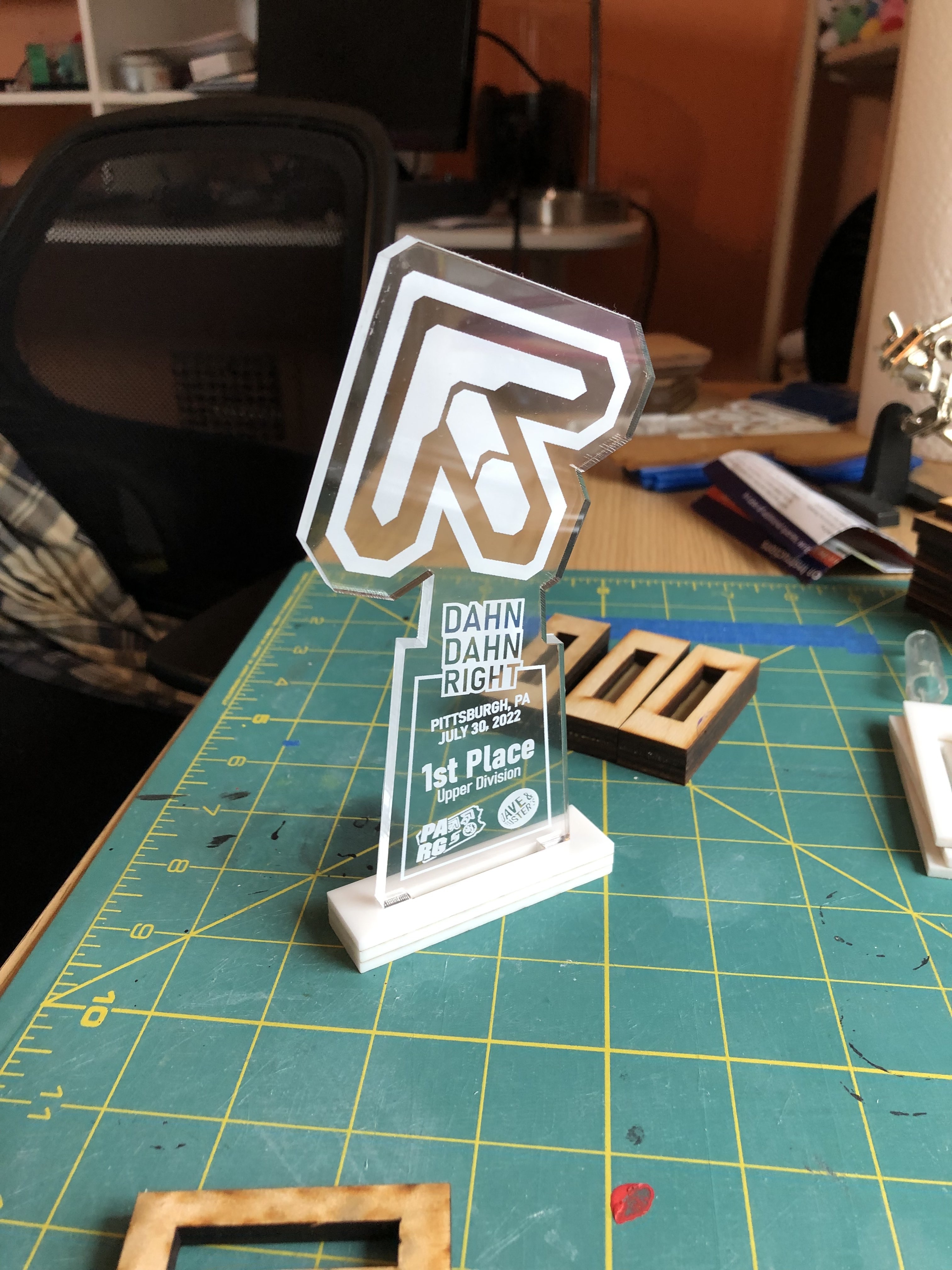 A picture of the Dahn Dahn right trophies from 2022 - laser cut, work in progress